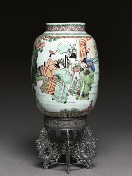 Lantern with figures in a gardenside