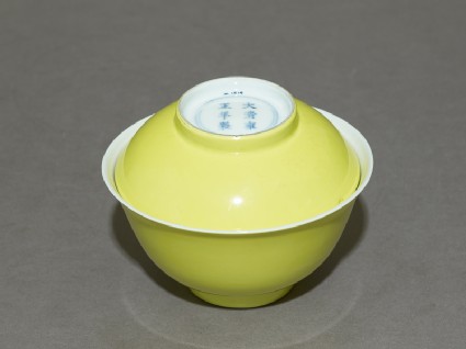 Bowl and lid with yellow glazeoblique