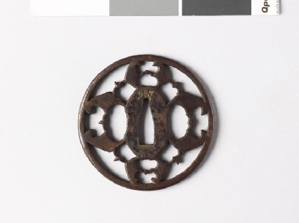 Round tsuba with myōga, or ginger shoots, and karigane, or flying geesefront