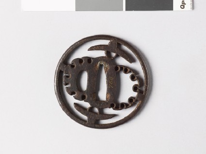 Round tsuba with hats and stylized snow heapsfront