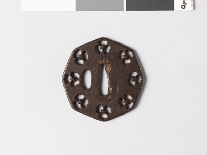 Octagonal tsuba with three-petalled flowersfront