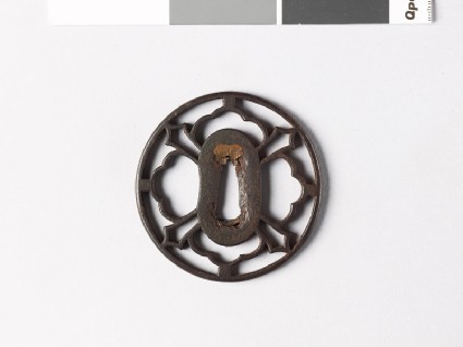 Tsuba with petals and sword-bladesfront