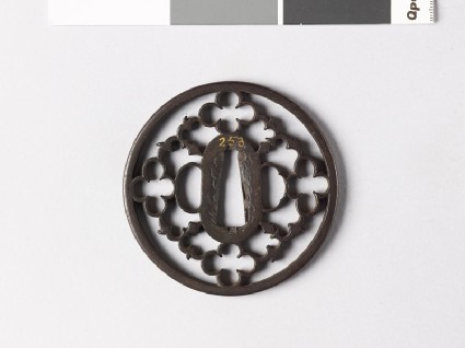 Round tsuba with karigane, or flying geesefront