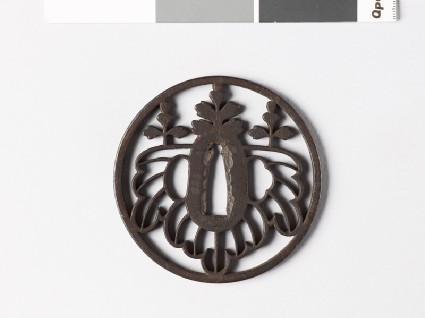 Round tsuba with gosan-no-kiri, or paulownia leavesfront