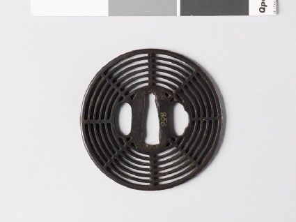 Round tsuba with cobweb designfront