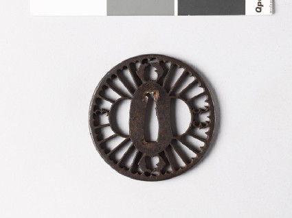 Round tsuba with myōga, or ginger shoots, and flying geese, or kariganefront