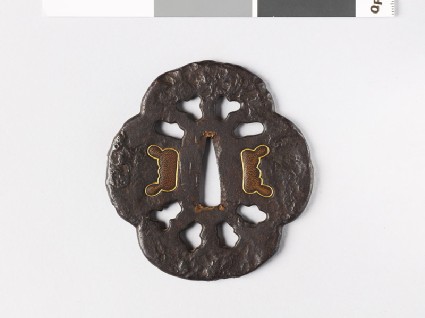 Mokkō-shaped tsuba with decorative plugsfront