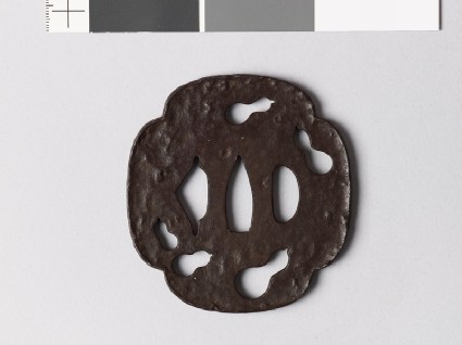 Mokkō-shaped tsuba with five gourds in negative silhouettefront