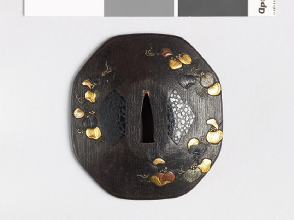 Octagonal tsuba with smilax plants and matsukawa-bishi, or overlapping lozengesfront