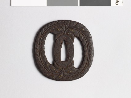 Tsuba with wisteria and dewdropsfront