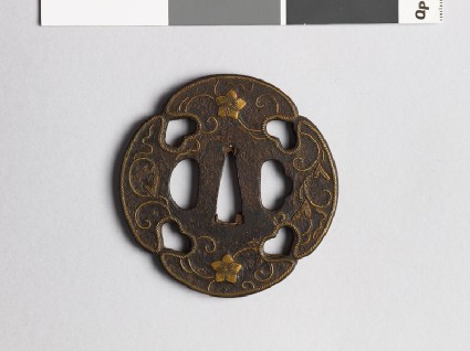 Mokkō-shaped tsuba with karakusa, scrolling floral patternfront