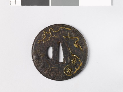 Round tsuba with landscape and plantsfront