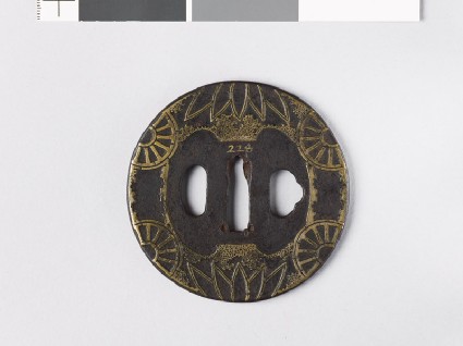 Round tsuba with half-wheels and bamboo leavesfront