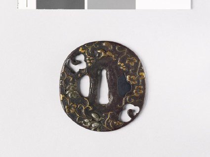Tsuba with squirrels and a vinefront