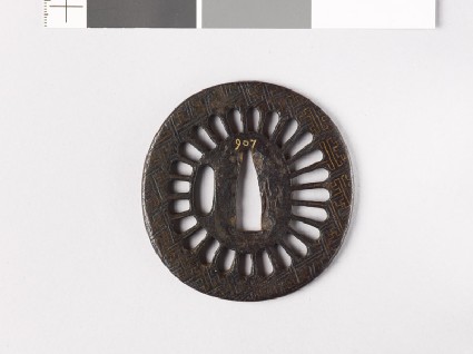 Tsuba with chrysanthemum florets and swastikasfront