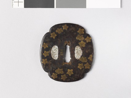 Mokkō-shaped tsuba with flowers and leavesfront