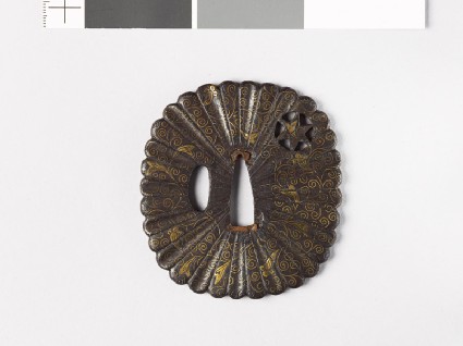 Tsuba with scrolling stems and heraldic clovesfront