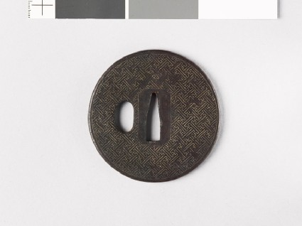 Round tsuba with swastikasfront