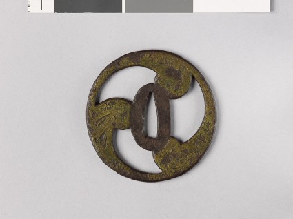 Tsuba in the form of a mitsudomoye, or three-comma shapefront