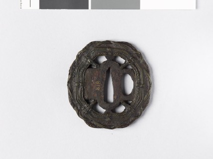 Octagonal tsuba with radiating decorationfront