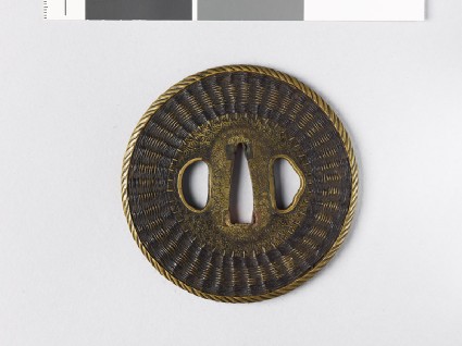 Tsuba with basketwork decorationfront