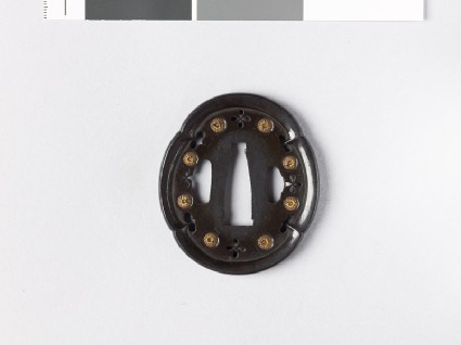 Mokkō-shaped tsuba with chrysanthemums and inome, or heart-shapesfront
