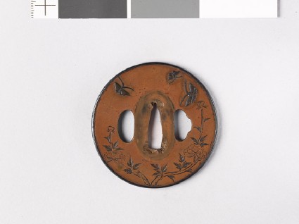 Round tsuba with peonies and butterfliesfront