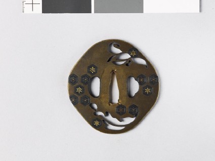 Tsuba with an orchid and hexagonsfront