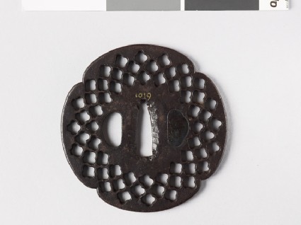 Mokkō-shaped tsuba with quatrefoil perforationsfront