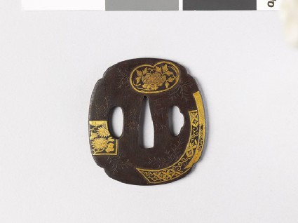 Tsuba with fan mounts and flowersfront