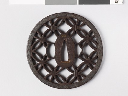 Round tsuba with interlacing rings and leavesfront
