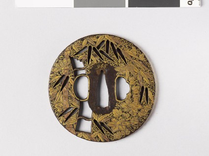 Round tsuba with bamboo and clematisfront