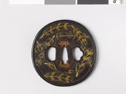 Tsuba with heraldic hawk feathersfront