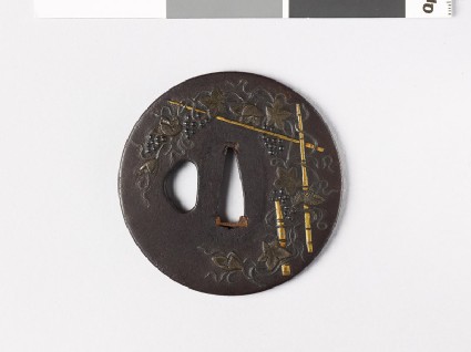 Round tsuba with vines and bamboofront