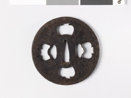 Tsuba with key pattern and seaweed-like spraysfront