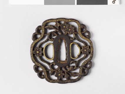 Tsuba with cruciform border and flowersfront