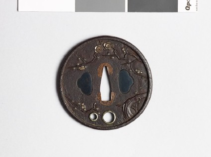 Tsuba with flowering plum treefront