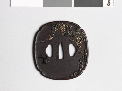 Mokkō-shaped tsuba with wisteria and a swallowfront