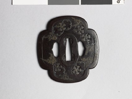 Mokkō-shaped tsuba with petals or snow crystalsfront