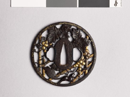 Round tsuba with grape vine and squirrelfront