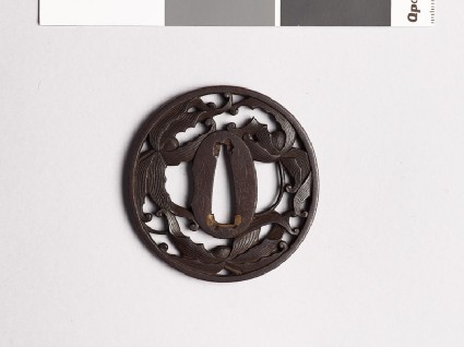 Tsuba with clematis flowersfront