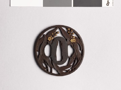 Tsuba with arrowhead leaves and flowersfront