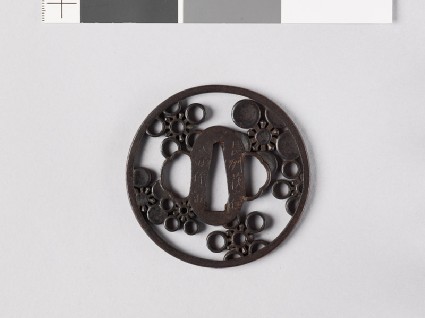 Round tsuba with mon crests of the Mayeda familyfront