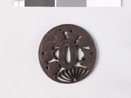 Tsuba with chrysanthemum and an aster flowerfront