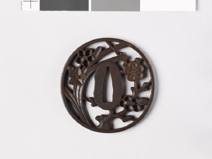 Round tsuba with plum blossom and narcissus flowersfront