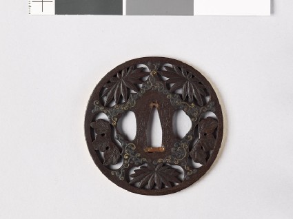 Tsuba with chrysanthemum leaves and scrolling stemsfront