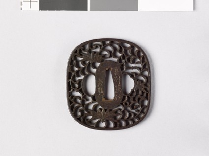 Tsuba with karakusa, or scrolling plant patternfront