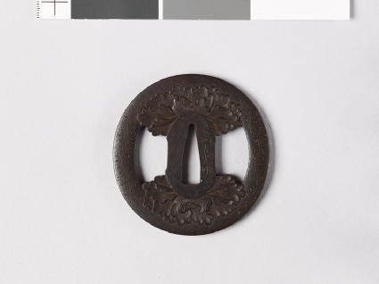Tsuba with peonies and karakusa, or scrolling plant patternfront