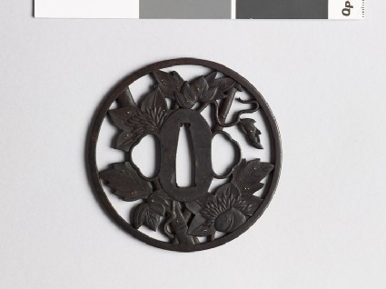 Round tsuba with clematis vine and dewdropsfront