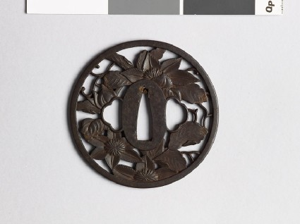 Round tsuba with clematis vinefront